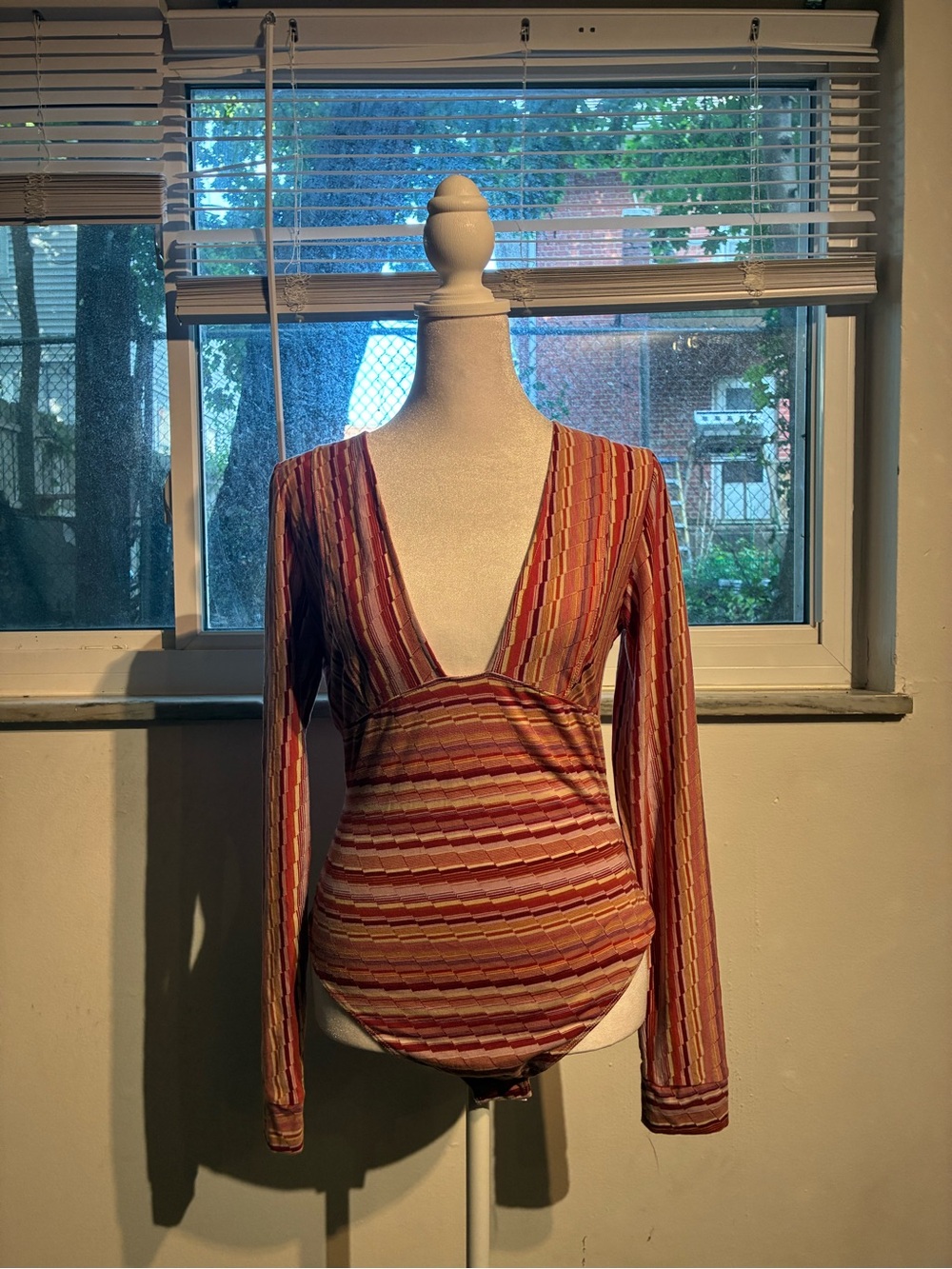 Free People Striped Long-Sleeve V-Neck Bodysuit in Rust and Pink